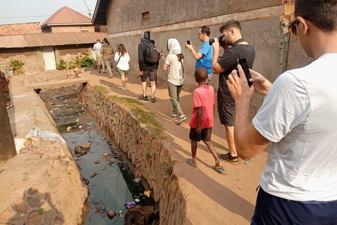 Best Kampala group Walking Tour. - Monuments and leadership stops: WWII marker and Independence Monument
