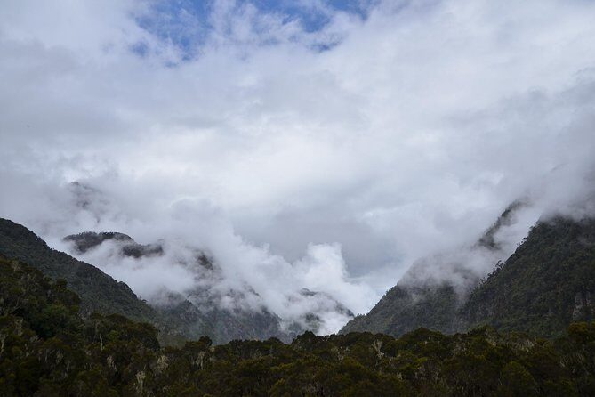Mountain Rwenzori Trekking Uganda 9 Day Safari - From Entebbe to Kasese: equator photos, then the long road into Rwenzori country